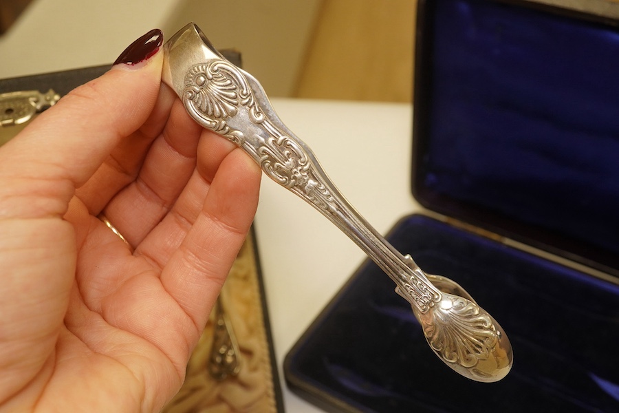 A French 800 standard white metal taste vin, 11cm, together with a George III silver toddy ladle, London, 1799, a cased set of six Art Nouveau silver coffee spoons by William Hutton & Sons and two incomplete cased silver